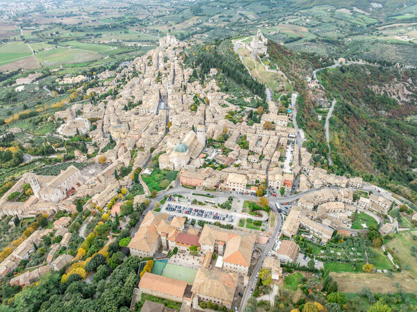 An aerial view of Assisi Rocca Minore and Maggiore, medieval town with city walls in Umbria Italy