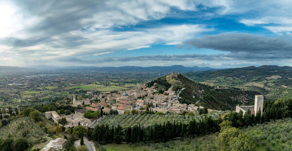 An aerial view of Assisi Rocca Minore and Maggiore, medieval town with city walls in Umbria Italy