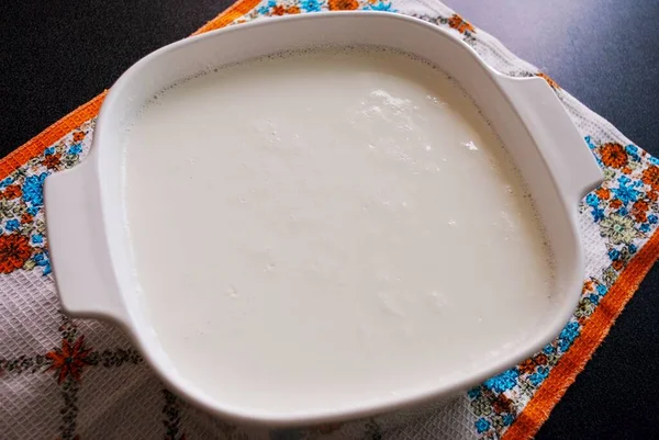 Fresh natural homemade plain white yogurt on table cloth. — Stock Photo, Image