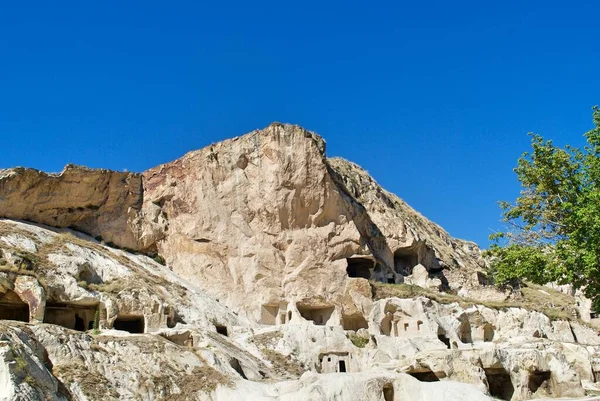 Село мешкало в покинутих печерних будинках у Горемі. UNESCO World Heritage site Кападокія Туреччина — стокове фото