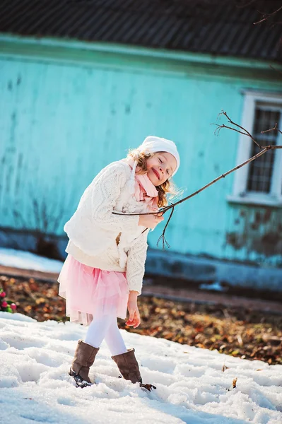 Happy child girl on the walk in early spring — Stock Photo, Image