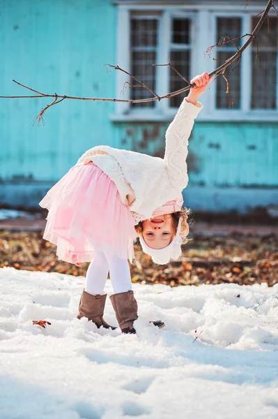Child girl having fun on the walk in early spring — Stock Photo, Image