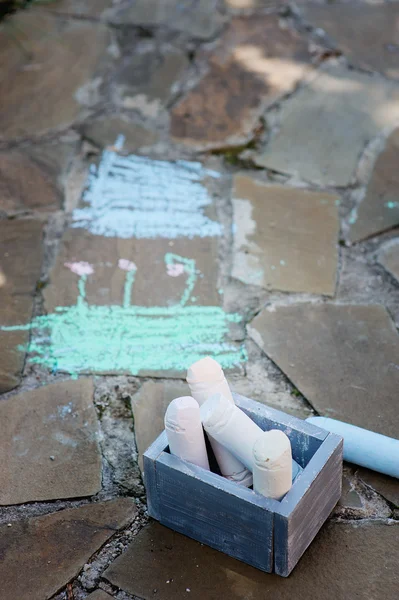 Kids chalks on stone pathway — Stock Photo, Image