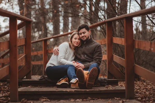 Loving young couple happy together outdoor on cozy warm walk in forest — Stock Photo, Image