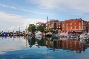 Izola, Slovenia - September 10, 2015: Hotel Marina, city and sea view in summer clipart