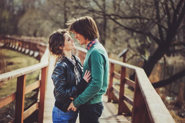 loving couple happy together outdoor on  rainy walk on country side, cozy mood