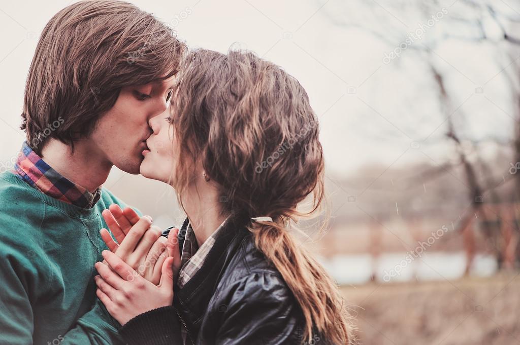 happy young loving couple walking outdoor in early spring. Outdoor activities. Valentine day on countryside.