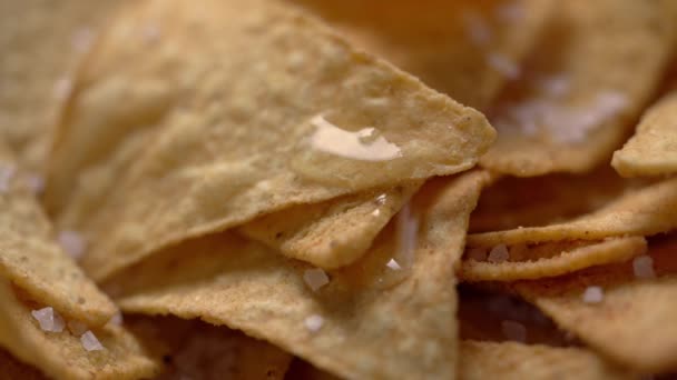 Adding oil on Tortilla chips. Close-up — Stock Video