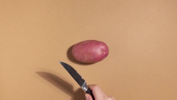 Stop motion animation of Cutting potato and transformation to chips — Stok Video