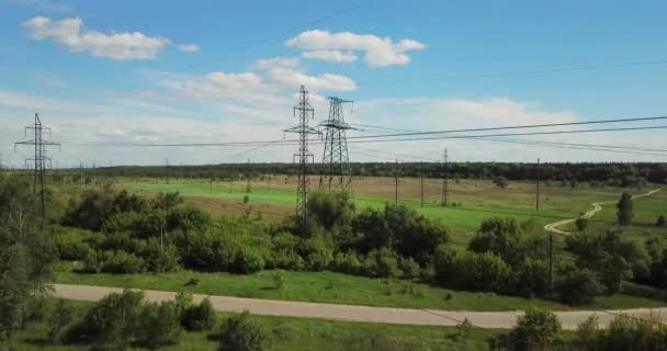 Drone view on high voltage power lines, rural scene — Stock Video