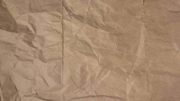 Stop motion of Crumpled craft paper background. — Vídeo de Stock
