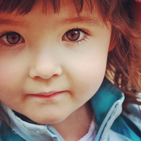 instagram closeup up of little girl with stunning brown eyes