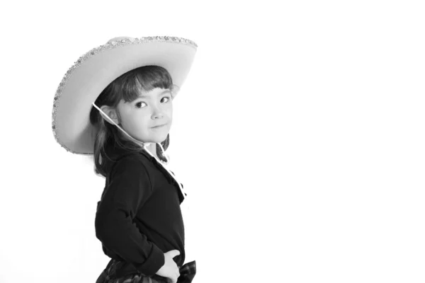 Cute little girl in cowboy hat isolated black and white — Stock Photo, Image