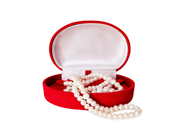 pearl necklace in a red velvet box isolated
