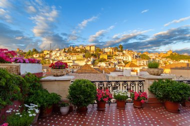 Sunset view of the historic quarter Albaicin and Alhambra, Gran Via de Colon, Granada, Andalusia, Spain clipart
