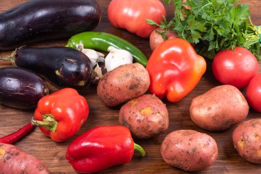 Ingredients for an Italian vegetable stew with potatoes, eggplant and pepper - Cianfotta, ciambotta napoletana.