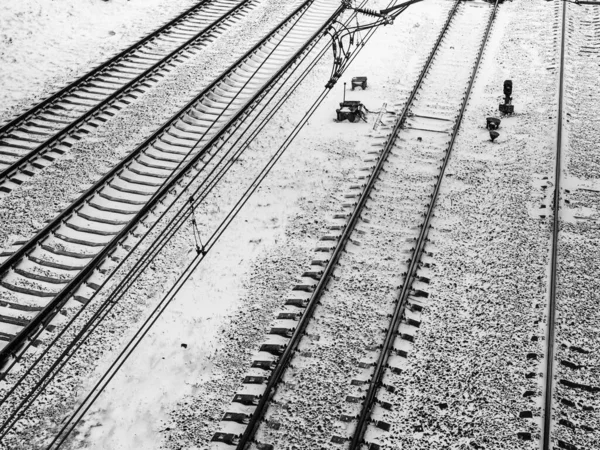 Snow covered railway track in winter, top view - winter background, copy space