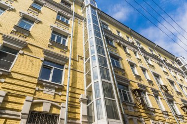 Moscow, Russia, July 15, 2017 - architecture of the early 20th century - residential building with an external elevator shaft