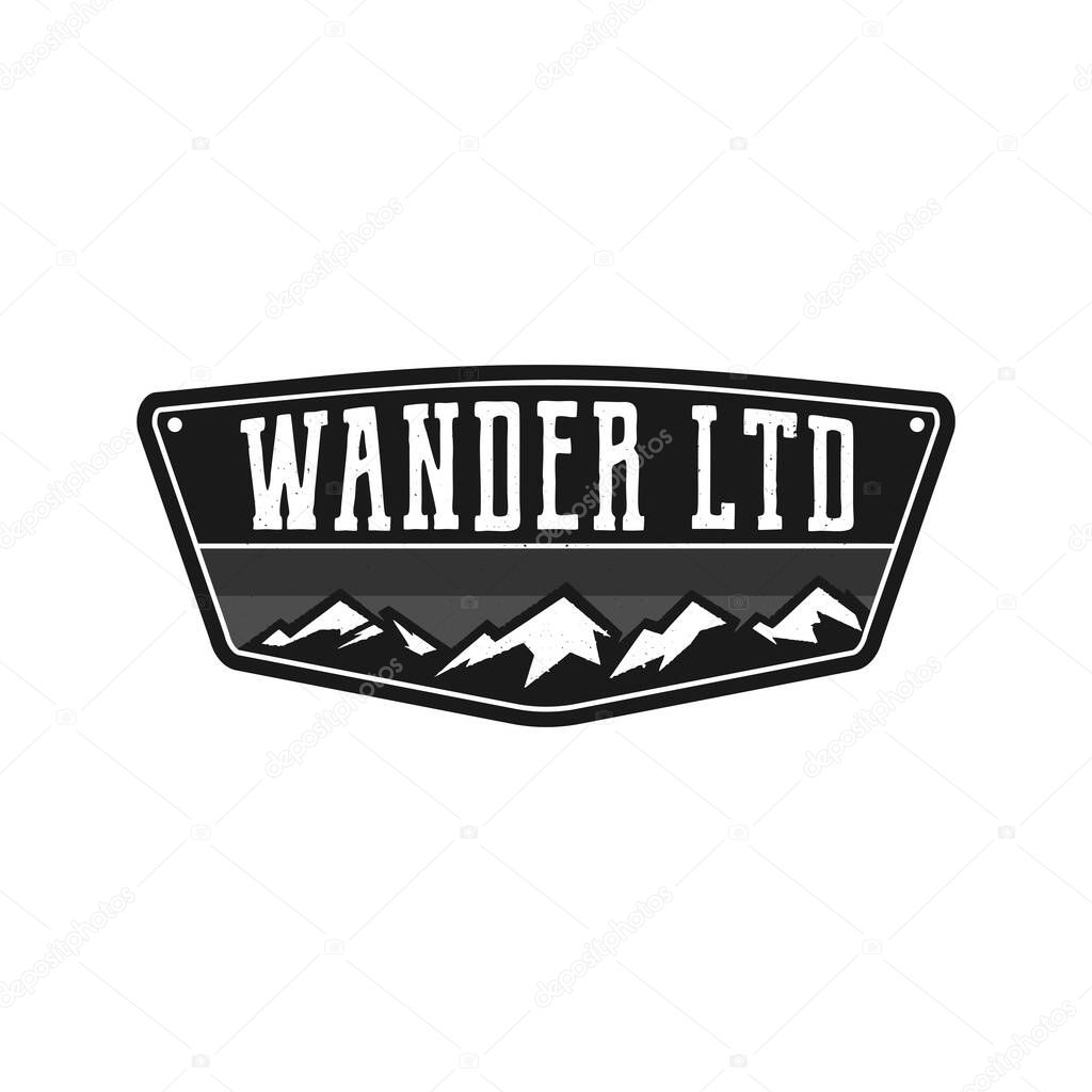 Mountain Illustration, outdoor adventure logo badge. Wander LTD text. Vintage hand drawn camping emblem in monochrome style. Stock vector label isolated on white background.