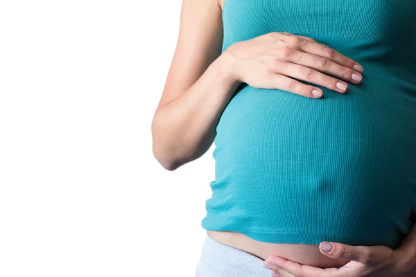 Güzel karın beyaz arka plan üzerinde izole olan hamile kadın