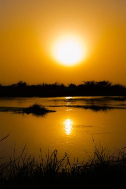 Güzel gün doğumu göle yansıyor, Jeddah - Suudi Arabistan