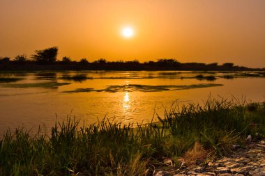 Gün doğumu göle yansıyor, Jeddah - Suudi Arabistan