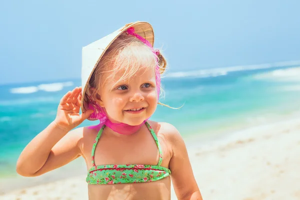 Funny face portrait of happy child in vietnamese straw hat — Stock Photo, Image