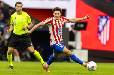 Madrid, İspanya - 18 Ekim 2025: Atletico Madrid ile Osasuna arasında oynanan La Liga maçı Metropolitano 'da oynandı. Maç boyunca Atletico Madrid ve Osasuna oyuncuları.