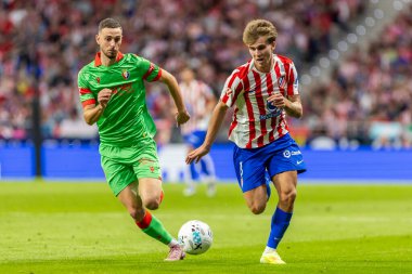 Madrid, İspanya - 18 Ekim 2025: Atletico Madrid ile Osasuna arasında oynanan La Liga maçı Metropolitano 'da oynandı. Maç boyunca Atletico Madrid ve Osasuna oyuncuları.