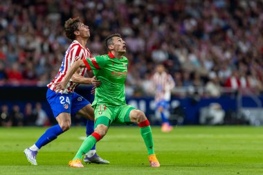 Madrid, İspanya - 18 Ekim 2025: Atletico Madrid ile Osasuna arasında oynanan La Liga maçı Metropolitano 'da oynandı. Maç boyunca Atletico Madrid ve Osasuna oyuncuları.