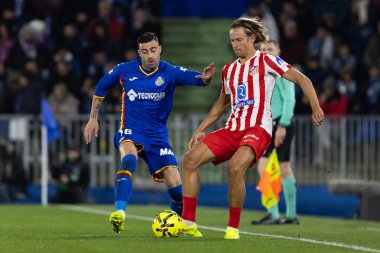 Madrid, İspanya - 23 Kasım 2025: Getafe CF ve Atltico de Madrid arasında oynanan lig maçı. Futbolcular. EA Spor Ligi. İspanya Ligi. Toplu futbolcular..