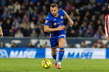 Madrid, İspanya - 23 Kasım 2025: Getafe CF ve Atltico de Madrid arasında oynanan lig maçı. Futbolcular. EA Spor Ligi. İspanya Ligi. Toplu futbolcular..