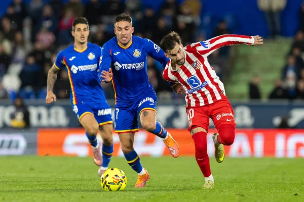 Madrid, İspanya - 23 Kasım 2025: Getafe CF ve Atltico de Madrid arasında oynanan lig maçı. Futbolcular. EA Spor Ligi. İspanya Ligi. Toplu futbolcular..