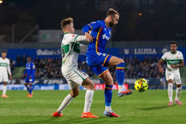 Madrid, İspanya - 28 Kasım 2025: Getafe CF ile Elche CF arasındaki lig maçı Getafe 'de oynandı. Maç sırasında Elche CF oyuncuları. EA Spor Ligi 2025.
