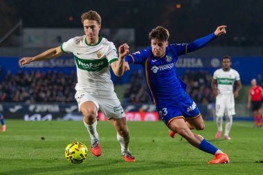 Madrid, İspanya - 28 Kasım 2025: Getafe CF ile Elche CF arasındaki lig maçı Getafe 'de oynandı. Maç sırasında Elche CF oyuncuları. EA Spor Ligi 2025.