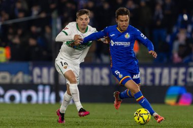 Madrid, Spain - November 28, 2025: League match between Getafe CF and Elche CF played in Getafe. Elche CF players during the match. EA SPORTS League 2025.