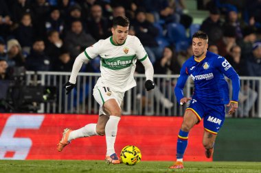 Madrid, Spain - November 28, 2025: League match between Getafe CF and Elche CF played in Getafe. Elche CF players during the match. EA SPORTS League 2025.