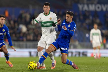 Madrid, İspanya - 28 Kasım 2025: Getafe CF ile Elche CF arasındaki lig maçı Getafe 'de oynandı. Maç sırasında Elche CF oyuncuları. EA Spor Ligi 2025.