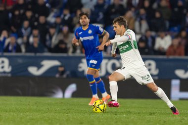 Madrid, Spain - November 28, 2025: League match between Getafe CF and Elche CF played in Getafe. Elche CF players during the match. EA SPORTS League 2025.