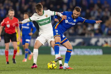 Madrid, İspanya - 28 Kasım 2025: Getafe CF ile Elche CF arasındaki lig maçı Getafe 'de oynandı. Maç sırasında Elche CF oyuncuları. EA Spor Ligi 2025.