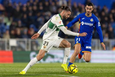 Madrid, İspanya - 28 Kasım 2025: Getafe CF ile Elche CF arasındaki lig maçı Getafe 'de oynandı. Maç sırasında Elche CF oyuncuları. EA Spor Ligi 2025.