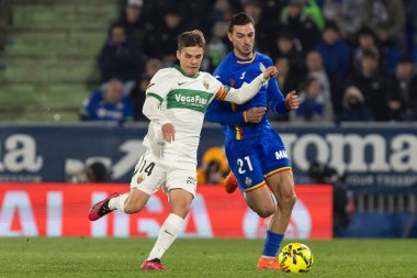 Madrid, Spain - November 28, 2025: League match between Getafe CF and Elche CF played in Getafe. Elche CF players during the match. EA SPORTS League 2025.