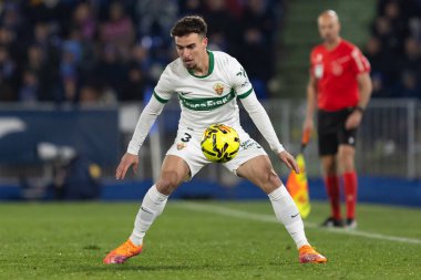 Madrid, İspanya - 28 Kasım 2025: Getafe CF ile Elche CF arasındaki lig maçı Getafe 'de oynandı. Maç sırasında Elche CF oyuncuları. EA Spor Ligi 2025.
