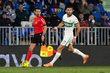 Madrid, İspanya - 28 Kasım 2025: Getafe CF ile Elche CF arasındaki lig maçı Getafe 'de oynandı. Maç sırasında Elche CF oyuncuları. EA Spor Ligi 2025.