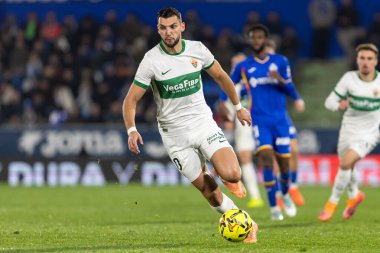 Madrid, Spain - November 28, 2025: League match between Getafe CF and Elche CF played in Getafe. Elche CF players during the match. EA SPORTS League 2025.