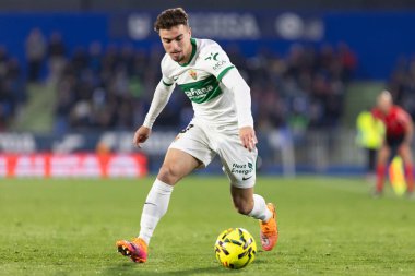 Madrid, İspanya - 28 Kasım 2025: Getafe CF ile Elche CF arasındaki lig maçı Getafe 'de oynandı. Maç sırasında Elche CF oyuncuları. EA Spor Ligi 2025.