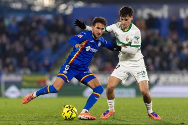 Madrid, İspanya - 28 Kasım 2025: Getafe CF ile Elche CF arasındaki lig maçı Getafe 'de oynandı. Maç sırasında Elche CF oyuncuları. EA Spor Ligi 2025.