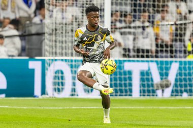 Madrid, Spain - December 7, 2025: La Liga match between Real Madrid and Celta Vigo played at the Santiago Bernabu Stadium in Madrid. Real Madrid players with the ball. Professional league. EA SPORTS