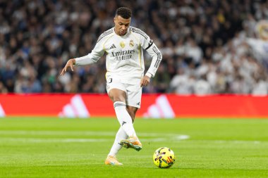 Madrid, Spain - December 7, 2025: La Liga match between Real Madrid and Celta Vigo played at the Santiago Bernabu Stadium in Madrid. Real Madrid players with the ball. Professional league. EA SPORTS