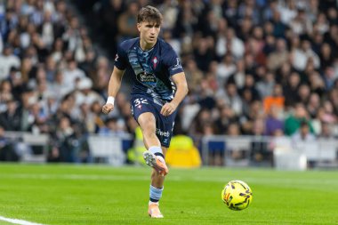 Madrid, Spain - December 7, 2025: La Liga match between Real Madrid and Celta Vigo played at the Bernabu Stadium in Madrid. Celta Vigo players with the ball. Professional league. EA SPORTS
